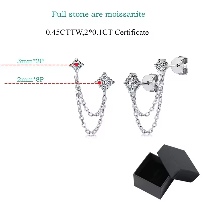 Pair of moissanite stud earrings with delicate tassel drop chains, sparkling in a silver setting